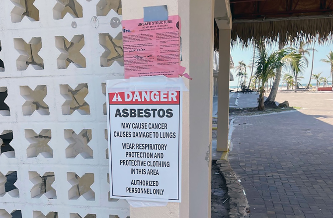 Asbesto warning sign on Lee County FL home 1